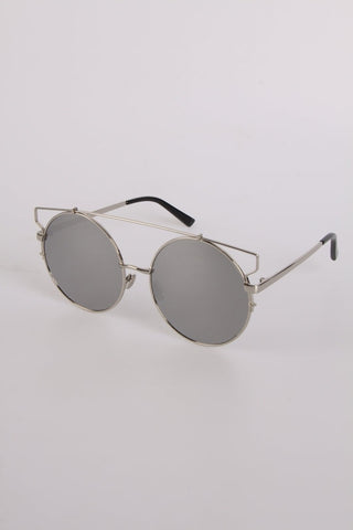 Round Sunglasses with darker tint in light frame