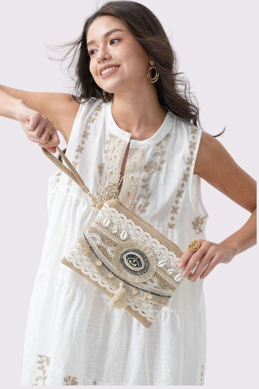 Eye Detail Shell Tassel Bag