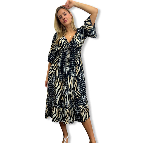 Plus Size Smocked Deep-V Maxi Dress with Bell Sleeves & Mixed Prints