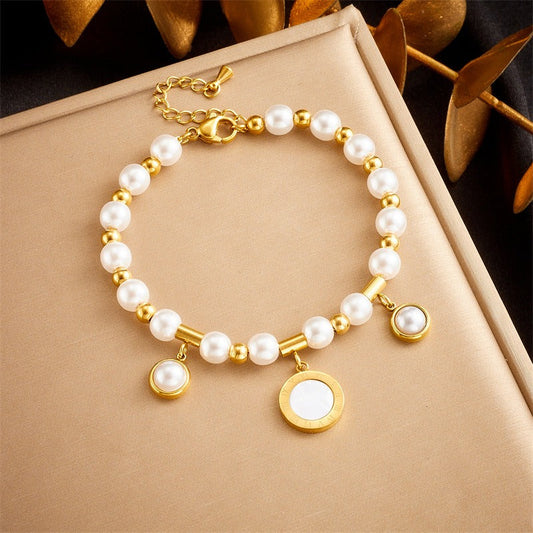 Elegant Pearl Bracelet with Gold Plated Charms French Inspired Design